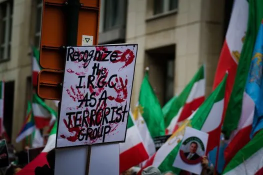 Far-right coalition attacks UK climate commitments at ultras gathering