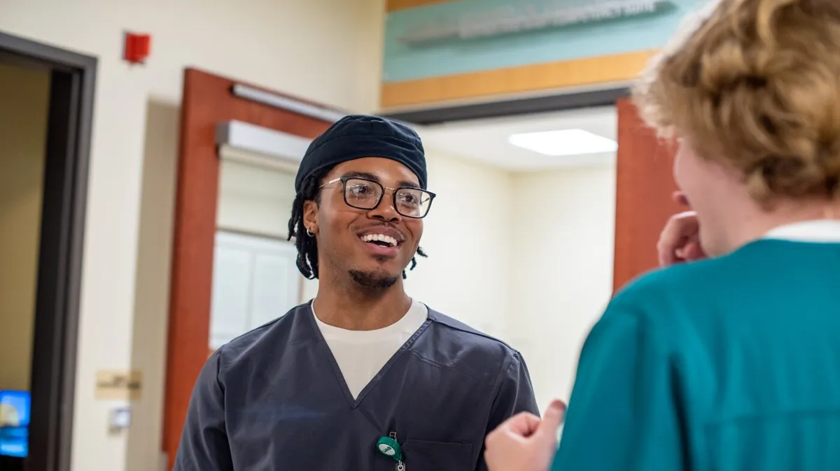 Nursing offers men a lifeline as manufacturing and tech shrink