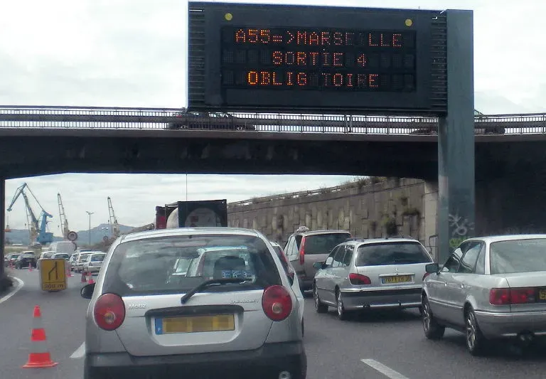 France's 'S' sticker asks: who gets left behind on the road?